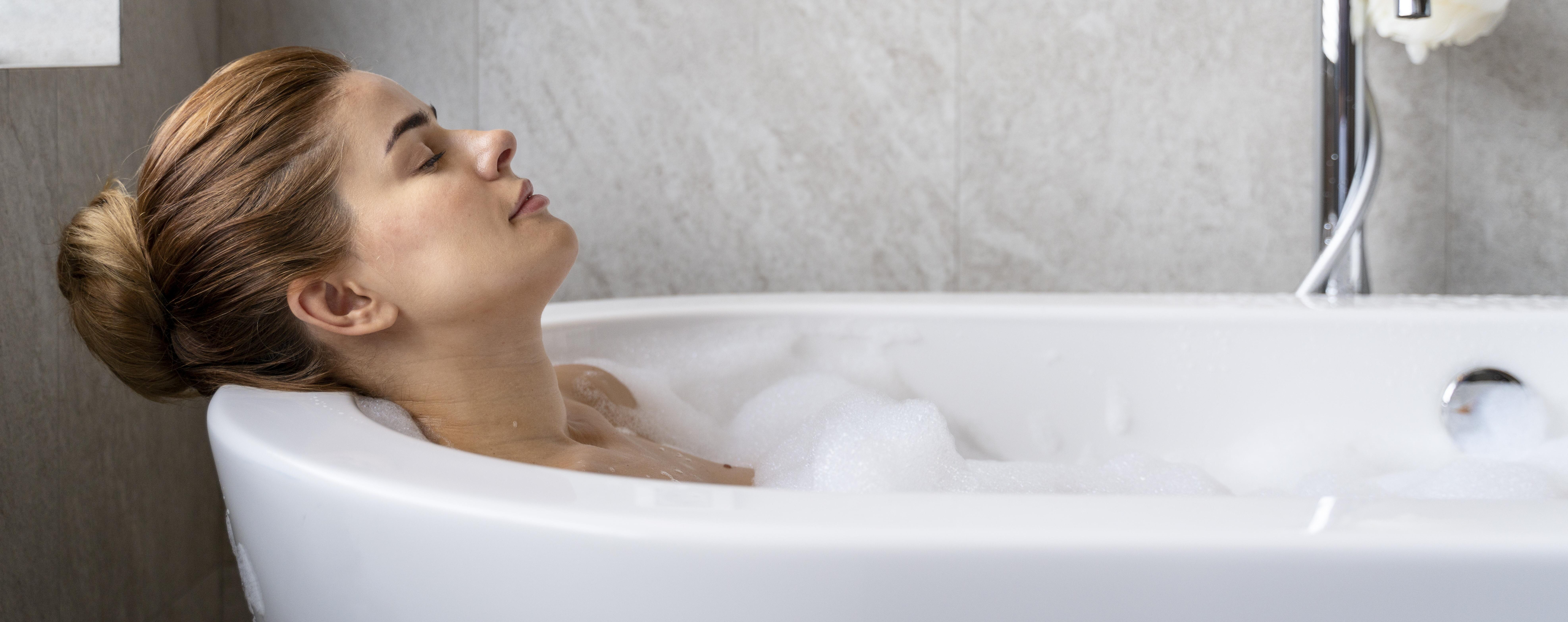 woman-enjoying-relaxing-bubble-bath